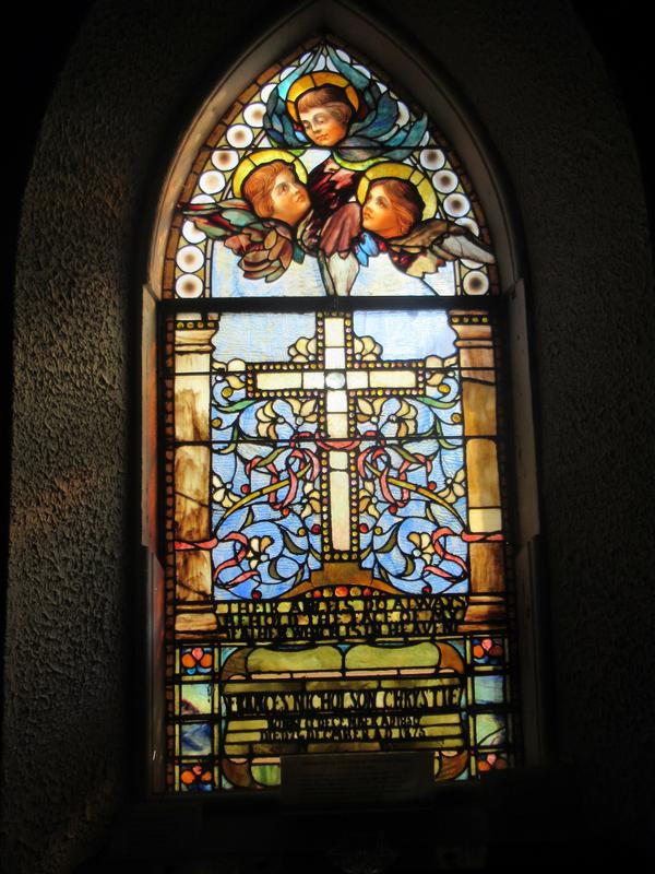 Chrystie Memorial Window:  ornamental with cross and angel faces