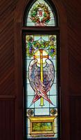 Florida, Hibernia, St. Margaret's Episcopal Church: Armstrong Memorial Window:  haloed cross, enveloped by two wings
