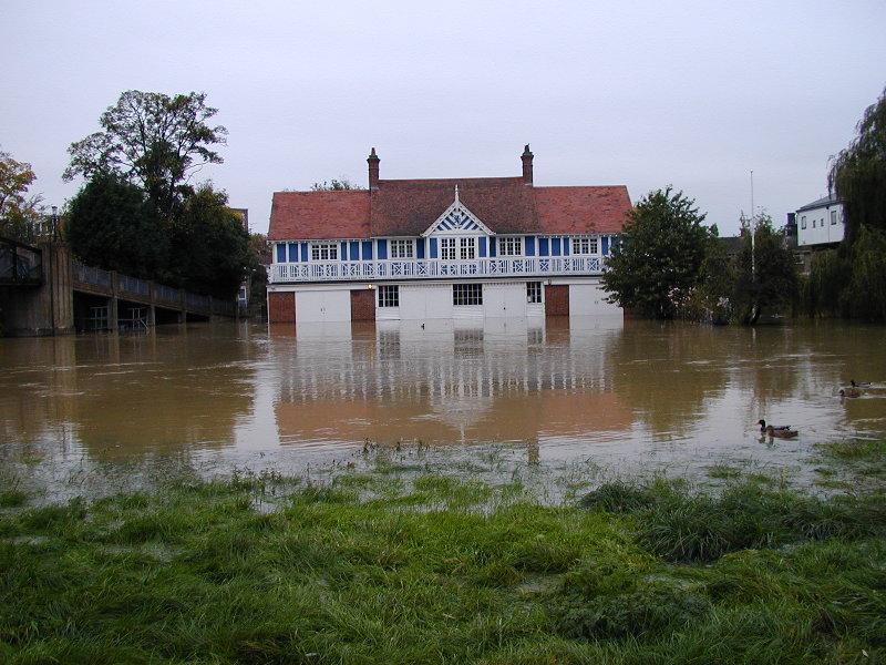 Emmanuel boathouse, partly under water, Cambridge, England