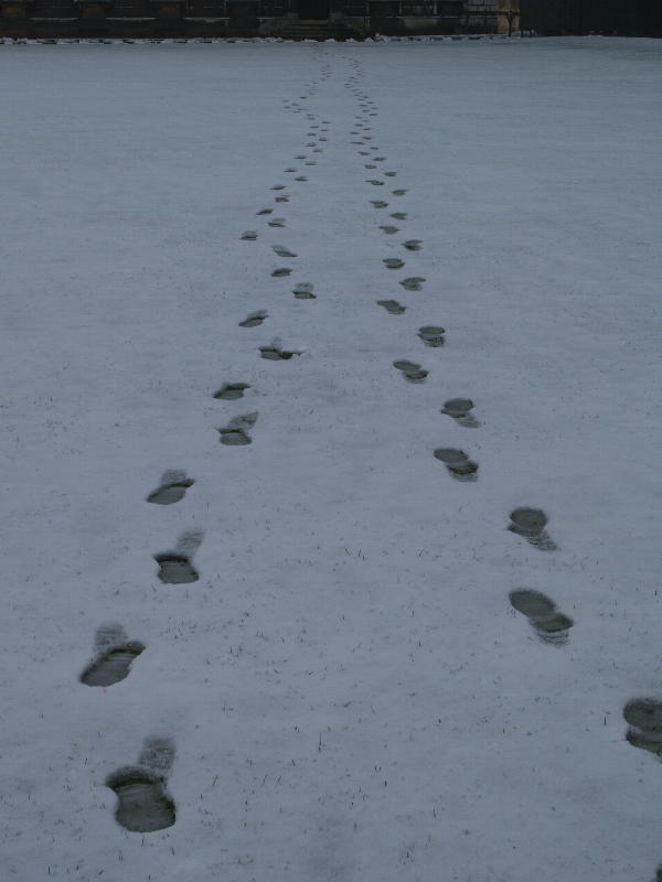 Footprints in snow, Front Court, King's College, Cambridge, England