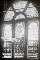 Willard Memorial Window:  woman with her hand resting on the dial of time, in the act of annunciating a truth, above her is a messenger of God, benigning blessings upon her for her life's acts and words