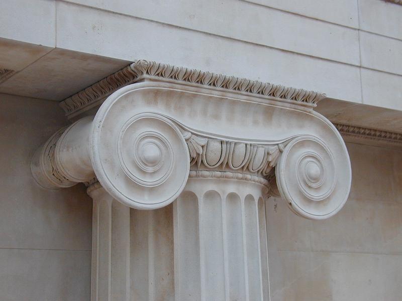 London, England: British Museum: Ionic order capital of column in Great Court (showing volutes, and egg and dart decoration)
