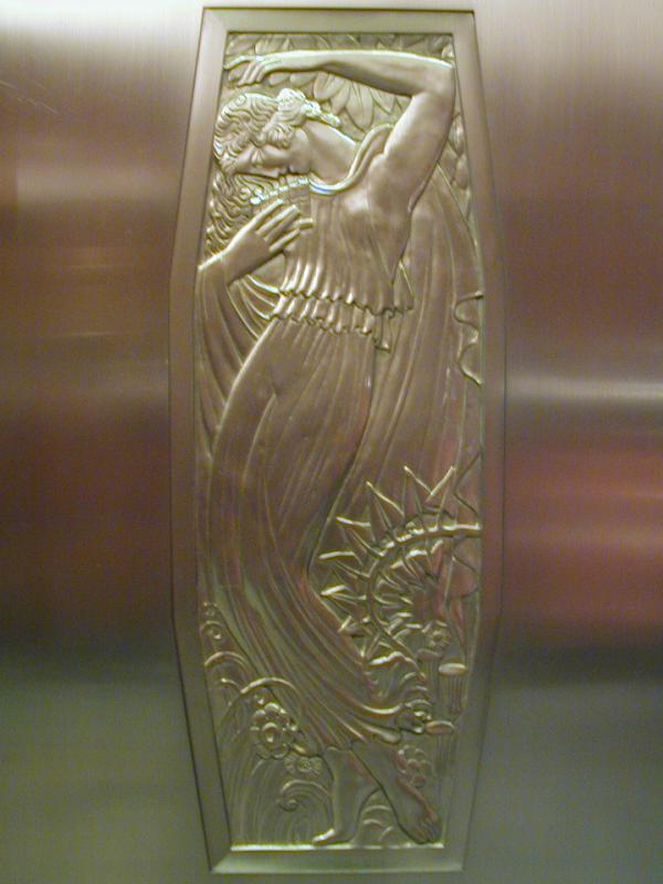 New York City, NY: Waldorf Astoria hotel: elevator (lift) door detail (art deco, 1931, architect Schultze and Weaver)