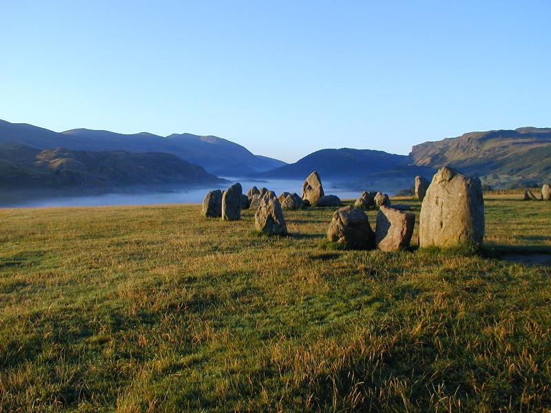 Lake District, England: Castlerigg: stone circle (early morning, with fog in valley)