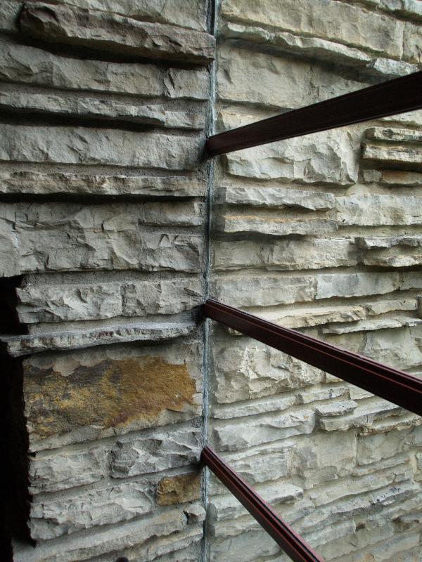 Mill Run, Pennsylvania (PA): Fallingwater (Kaufmann House): window embedded in stone, second floor dressing room (1935-1937, architect Frank Lloyd Wright)