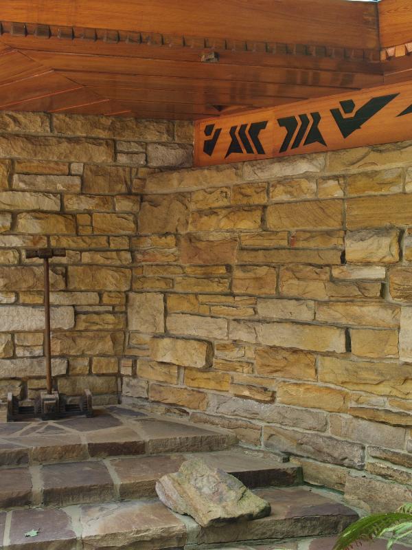 Chalk Hill, Pennsylvania (PA): Kentuck Knob (I.N. and Bernardine Hagan House): entrance area detail (steps, wall frieze, small triangular rain drain) (1954-1956, architect Frank Lloyd Wright)