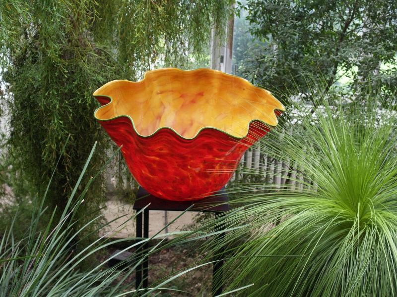 London, England: Kew Gardens: orange-red 'Macchia' (glass artist Dale Chihuly)