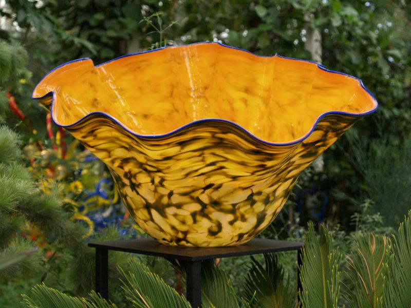 London, England: Kew Gardens: orange 'Macchia' (glass artist Dale Chihuly)