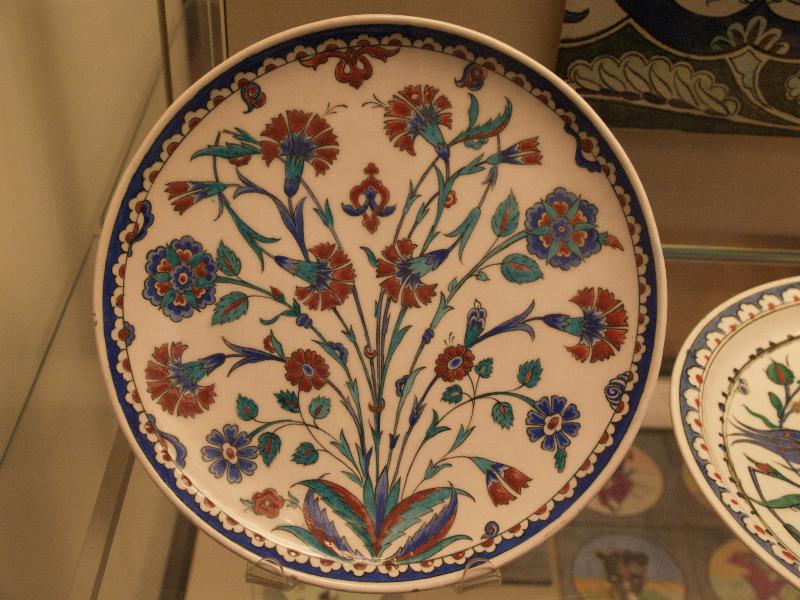 London, England: British Museum: plate in the Iznik manner (1870, by Theodore Deck) (inspired by 16th century Iznik plates, real one just at right in photo)