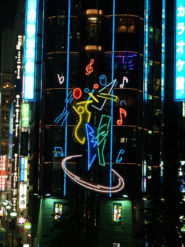 Tokyo, Japan: Shinjuku: night lights, club advertisement