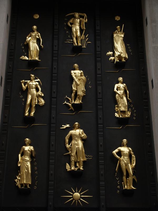 New York City, NY: 620 Fifth Avenue (British Empire Building, Rockefeller Center): 'Industries of the British Commonwealth' (sculptures above door -- salt, wheat, wool, coal, fish, cotton, tobacco and sugar -- art deco, 1932, Carl Paul Jennewein)