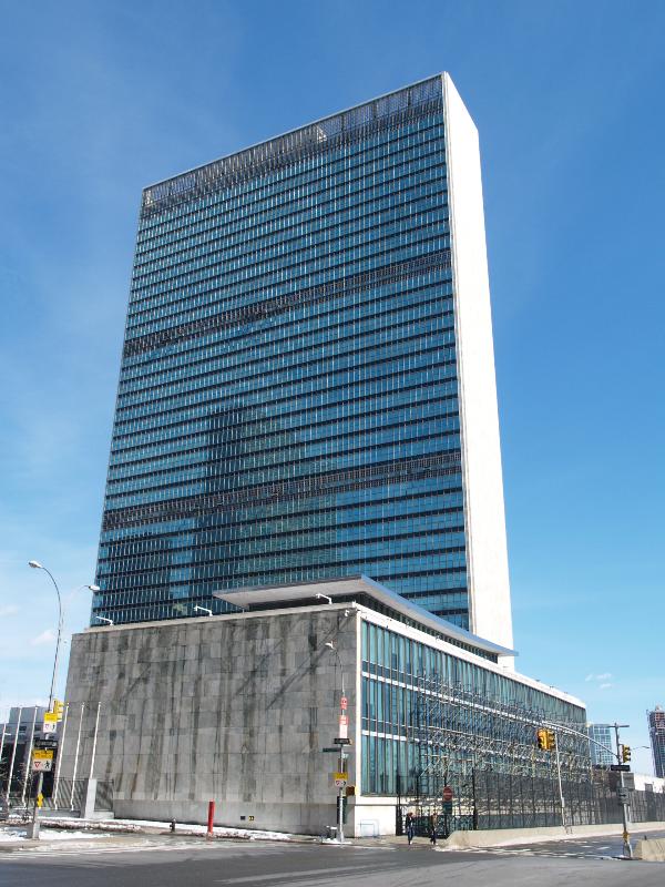 New York City, NY: United Nations (First Avenue), Secretariat Building and Hammarskjold Library: view (Secretariat Building, 1947-1953, Le Corbusier, Oscar Niemeyer, Sir Howard Robertson, et al. with Harrison and Abramovitz; Hammarskjold Library, 1963, Harrison, Abramovitz and Harris)