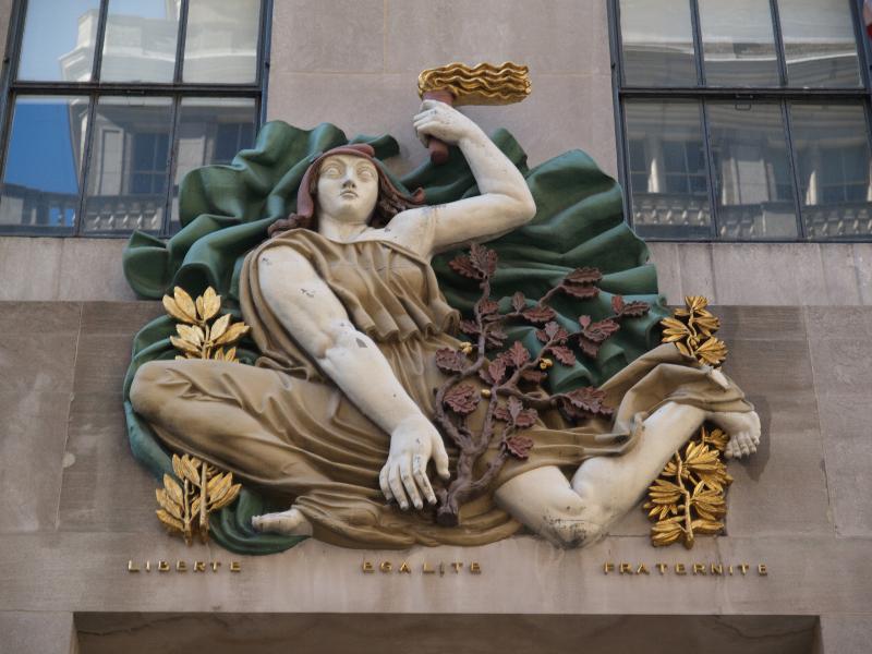 New York City, NY: 610 Fifth Avenue (La Maison Francaise, Rockefeller Center): 'Torch of Freedom' (or 'Gallic Freedom') (decoration above main entrance) (art deco, 1933, Alfred Janniot)