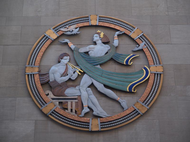 New York City, NY: Radio City Music Hall (West 50th Street): 'Song' (enameled metal rondel) (art deco, 1932, Hildreth Meiere)