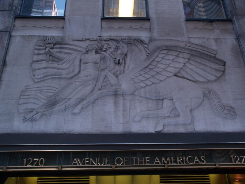 New York City, NY: Radio City Music Hall (Sixth Avenue, Avenue of the Americas): 'Present' (decoration over entrance) (art deco, 1932, Robert Garrison)