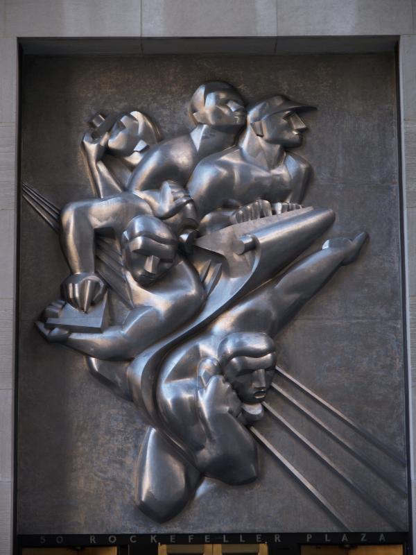 New York City, NY: 50 Rockefeller Plaza (Bank of America, formerly Associated Press Building, Rockefeller Center): 'News' (sculpture over door) (1940, Isamu Noguchi)