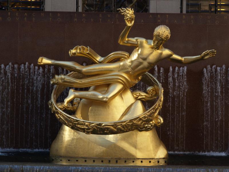 New York City, NY: Rockefeller Plaza (Rockefeller Center): 'Prometheus' (skating rink, lower plaza, sculpture) (art deco, 1934, Paul Manship)