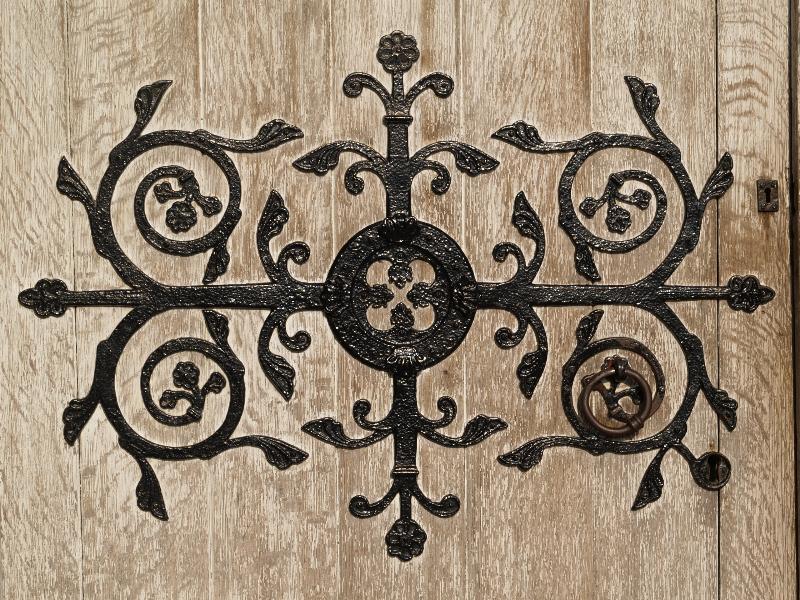 Higham Ferrers, England: Parish Church of St Mary the Virgin: door ironwork detail
