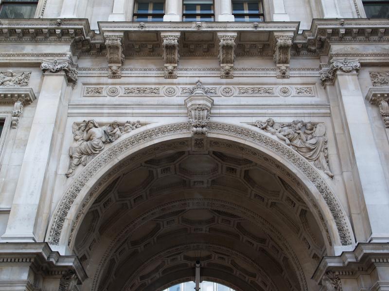 London, England: Piccadilly, Burlington House: archway of courtyard entrance (1869-1873, architects Robert Richardson Banks and Charles Barry, Jr.)