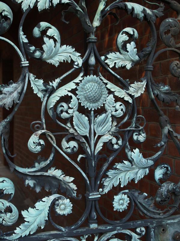 Cambridge, England: Newnham College: Pfeiffer Archway gate detail (1893, designed by Basil Champneys, made by Thomas Elsley)