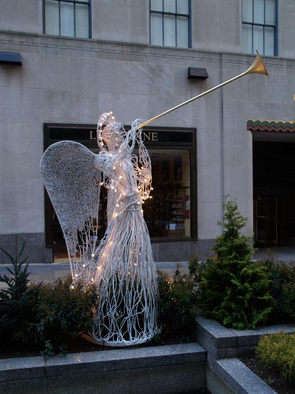 New York City, NY: Rockefeller Plaza (Channel Gardens, Rockefeller Center): Christmas angel (1954, Valerie Clarebout)