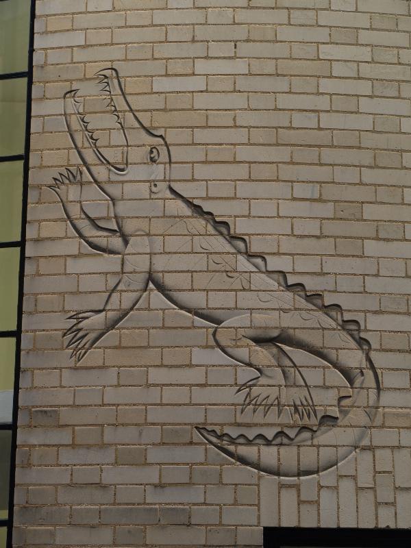Cambridge, England: New Museum Site (old Cavendish laboratory): crocodile relief (1932, sculptor Eric Gill)