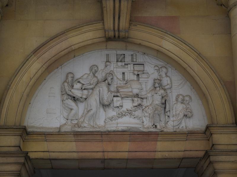 Cambridge, England: Trinity College: Wren Library, pediment ('Ptolemy II receiving the Septuagint from the Translators', c 1679)