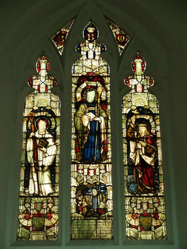 Cambridge, England: St Botolph's Church: chancel north window (c1900, St Botolph between St Bernard and St Margaret)