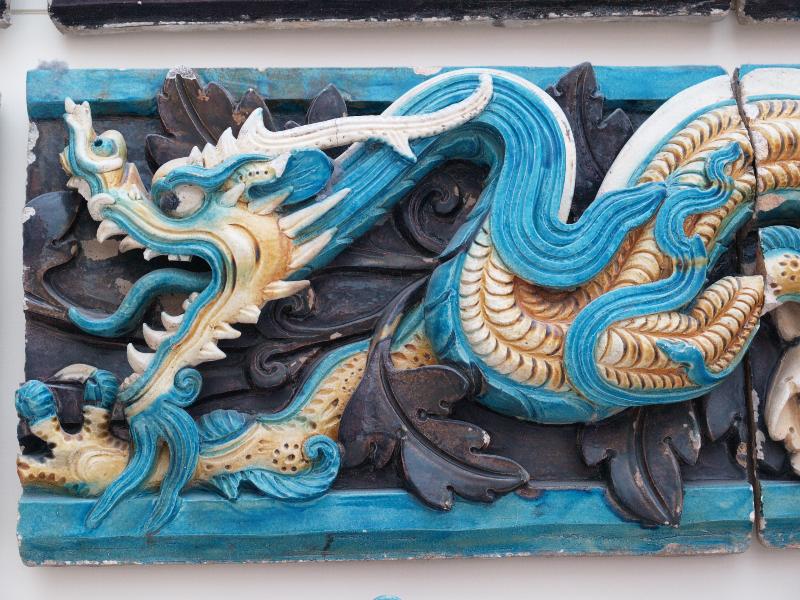 London, England: British Museum: dragon tiles, detail (15th-16th c, Ming dynasty, Shanxi Province, China, once decorated roof ridge of small buildings in a temple complex)