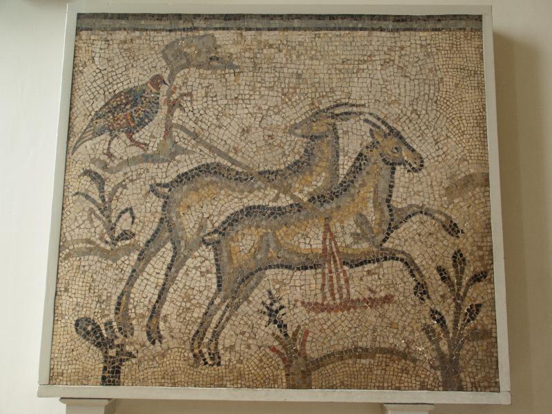 London, England: British Museum: partridge and two gazelles, one of which has been wounded by a javelin (5th or 6th c AD, from Carthage)