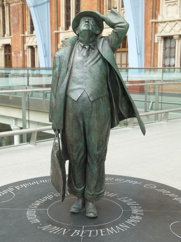 London, England: St Pancras Station: statue of John Betjeman (2007, sculptor Martin Jennings)