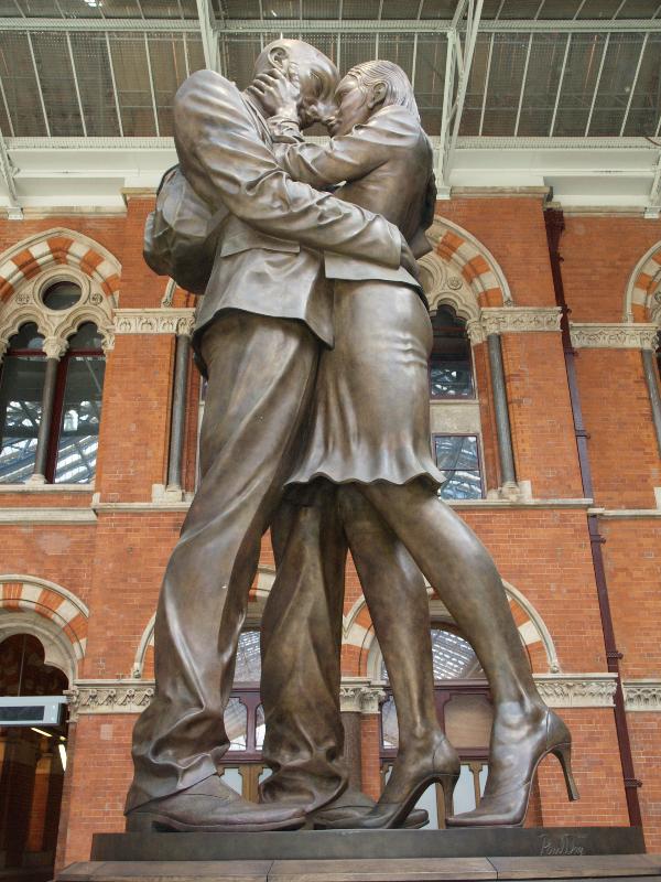 London, England: St Pancras Station: 'The Meeting Place' (2007, sculptor Paul Day)