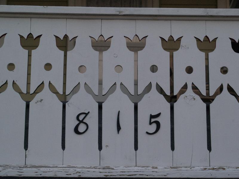 Cape May, New Jersey (NJ): 815 Columbia Avenue: porch railing with cutout tulip design