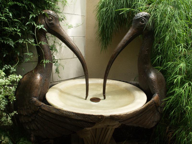 Kennett Square, Pennsylvania (PA): Longwood Gardens: Conservatory, bird bath held up by two birds