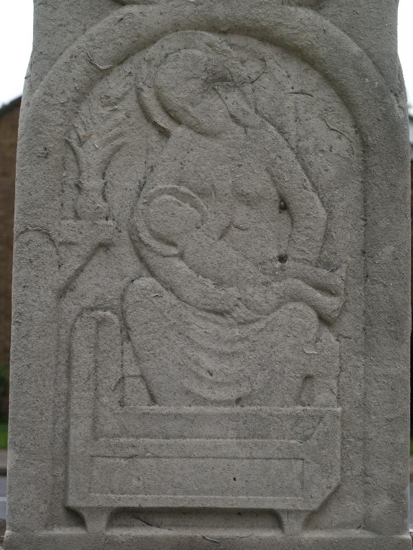 Trumpington, England: War Memorial: relief of Mother and Child (1921-1922, Eric Gill)