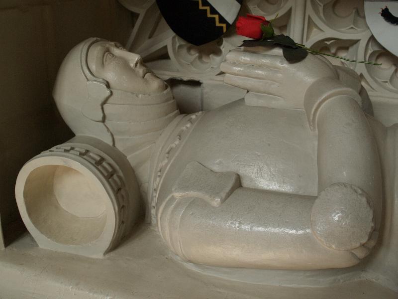 Long Melford, England: Holy Trinity Church: William Clopton tomb detail (died 1464) (since 1436 town of Hadleigh pays one red rose per annum as rent for guildhall and land for market)