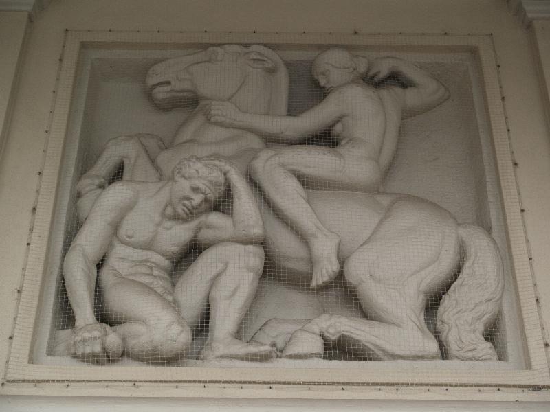Karlsruhe, Germany: Stadthalle (Festplatz): relief (woman on horse attacking man) (1915, sculptor Wilhelm Sauer, architect Curjel and Moser)