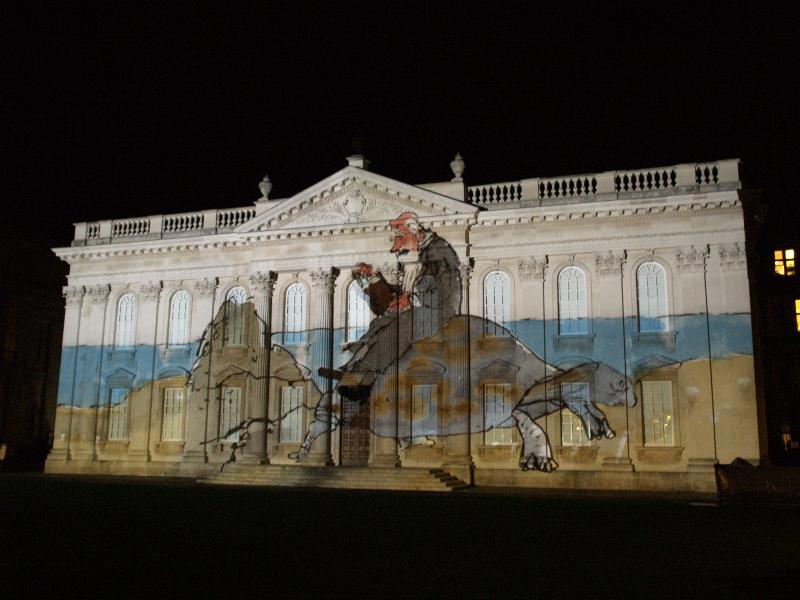 Cambridge, England: Senate House: light show: Charles Darwin on a Galapagos giant tortoise (Cambridge University 800th anniversary light show, officially 17-19 January 2009, light artist Ross Ashton, illustration Quentin Blake)