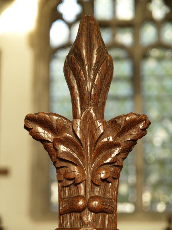 Cottenham, England: All Saints Church: pew bench carving (1867)