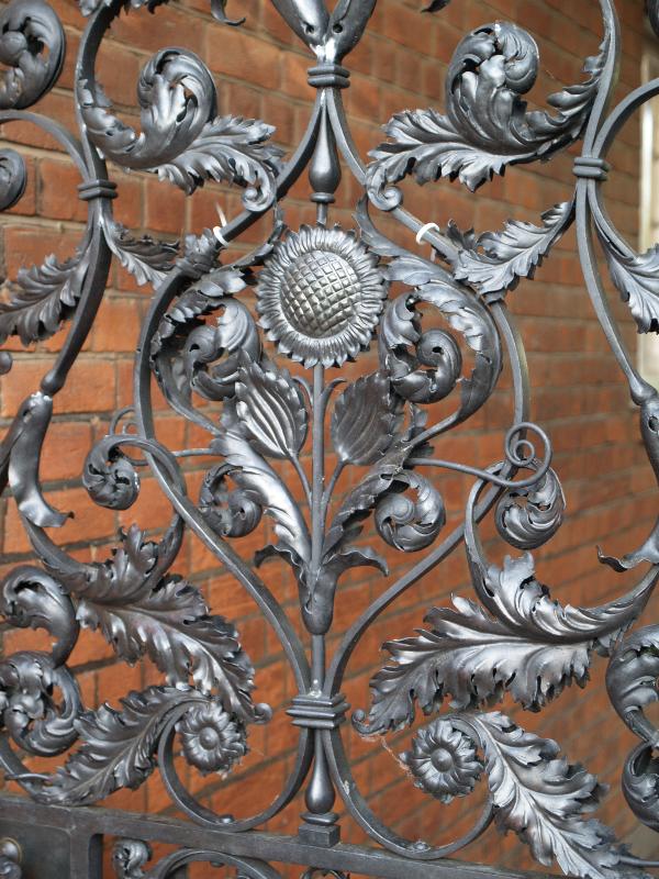 Cambridge, England: Newnham College: Pfeiffer Archway gate detail (1893, designer Basil Champneys, maker Thomas Elsley)