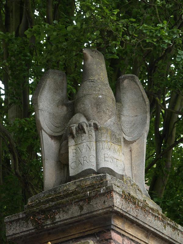 Cambridge, England: St John's College: eagle above gate pier (1939, sculptor Charles Wheeler)