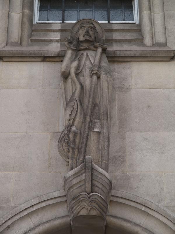 London, England: St Columba's Church of Scotland: St Columba with crane (c 1950, sculptor Vernon Hill)