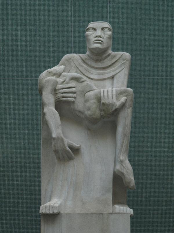 London, England: Congress House (TUC Headquarters): war memorial, pieta composition showing mother cradling her dead son (1950s, sculptor Jacob Epstein)