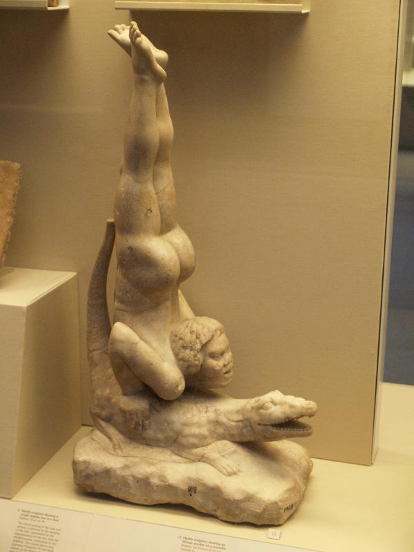London, England: British Museum: African acrobat on crocodile (1st century BC or 1st century AD, Roman)