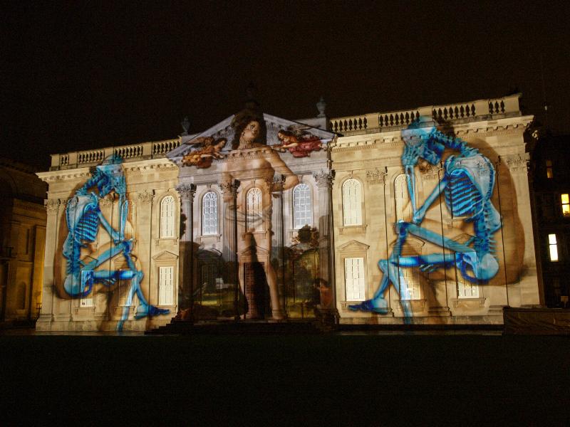 Cambridge, England: Senate House: light show: Martyrdom of St Sebastian and two skeletons (Cambridge University 800th anniversary light show, officially 16-18 January 2010, light artist Ross Ashton)