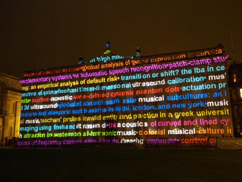 Cambridge, England: Senate House: light show: music and science words (Cambridge University 800th anniversary light show, officially 16-18 January 2010, light artist Ross Ashton)