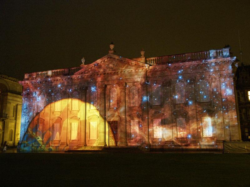 Cambridge, England: Senate House: light show: planet and stars (Cambridge University 800th anniversary light show, officially 16-18 January 2010, light artist Ross Ashton)