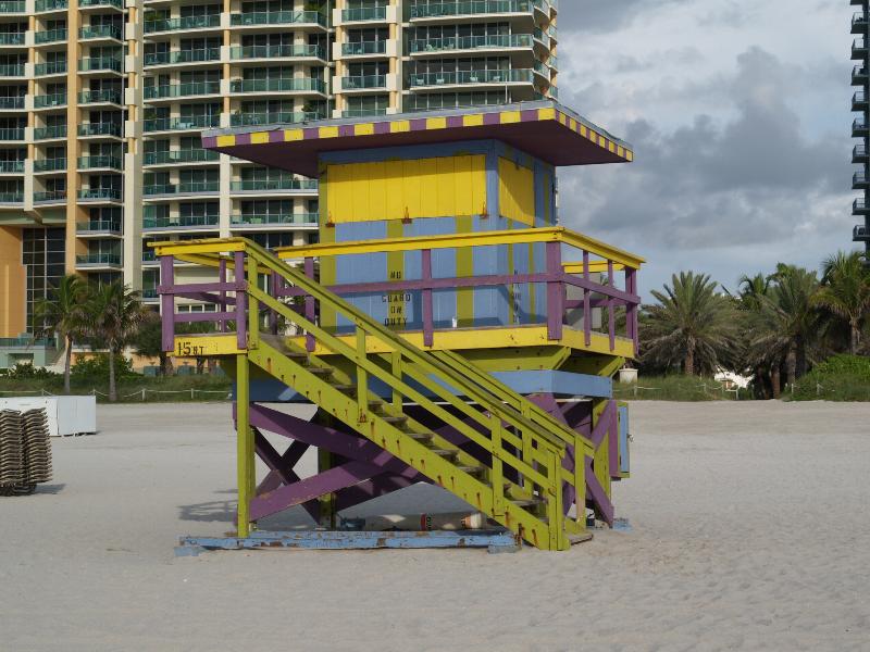 Miami Beach, Florida (FL): beach: yellow, purple, green and blue beach hut