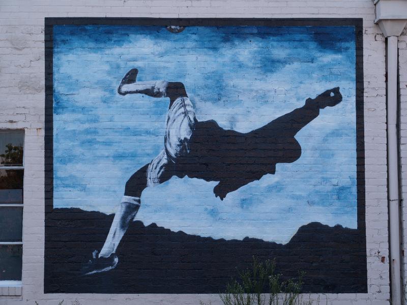 Richmond, Virginia (VA): 2320 West Main Street: soccer player kicking ball