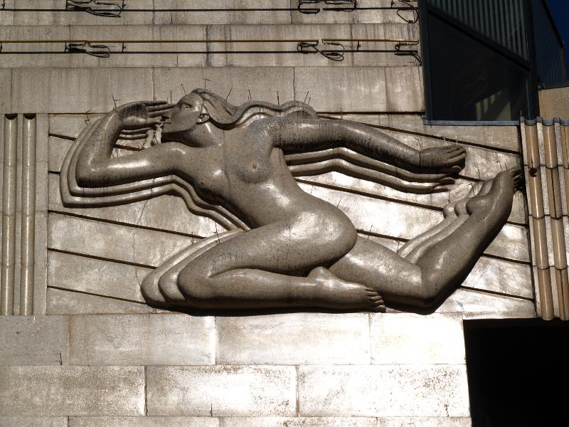 London, England: Cranbourne Street (Leicester Square), Vue Cinema (was Warner Theatre): Sight and Sound, female figure (1938, architects Edward A. Stone and T.R. Somerford, sculptor Edward Bainbridge Copnall)